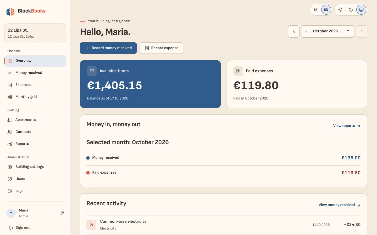 The BlockBooks overview on a computer: available funds, paid expenses for the month and recent activity for a sample building.